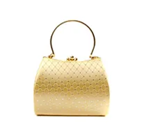 A gold-colored luxury purse